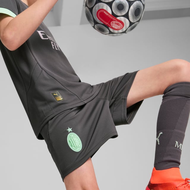 PRODUCT STORY: Hit the pitch like AC Milan's finest in these football shorts. They're made from sweat-wicking material to keep you cool in the tensest moments of the game and are finished with the team's famous crest on the leg. FEATURES & BENEFITS: dryCELL: Performance technology designed to wick moisture from the body and keep you free of sweat during exercise; As part of the RE:FIBRE program, this garment is made of at least 95% recycled material from textile waste and other used materials. DETAILS: Regular fit; 170 gsm, Jacquard; Medium rise; Official team branding; PUMA branding details; PUMA Youth: Recommended for older kids between 8 and 16 years.
