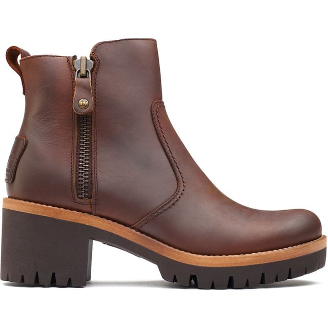 Step Out In Style And Confidence With The Panama Jack Pauline Ankle Boots. These Black Leather Boots Blend Premium Materials With The Durability Of A Sturdy, Cleated Rubber Sole For Grip, Whilst The Block Heel Provides Extra Height. Their Contemporary Design Showcases A Toggled Zip With Silver Hardware, Heel Branding And Contrasting Sole Detailing. They're As Stylish As Comfortable To Wear. Whether Navigating City Streets Or Exploring Country Fairs, These Panama Jack Boots Are Your Quintessential Companion For A Versatile, Chic Look.