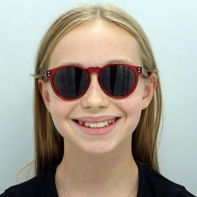 Smarty Round Kids Transparent Red Black Grey X2944  Sunglasses Brighten your child's day with SMARTY Designer Sunglasses model X2944F, perfect for kids aged 3 to 7 years old. These round-shaped sunglasses feature a vibrant red frame with durable plastic arms and grey lenses, offering superior UV protection and a fun, stylish look. The X2944F model combines trendy design with kid-friendly comfort and durability, making them ideal for any outdoor adventure. Available at an unbeatable discount from the regular retail price, these designer sunglasses provide exceptional quality and value. Equip your child with the perfect blend of style and protection with SMARTY sunglasses.