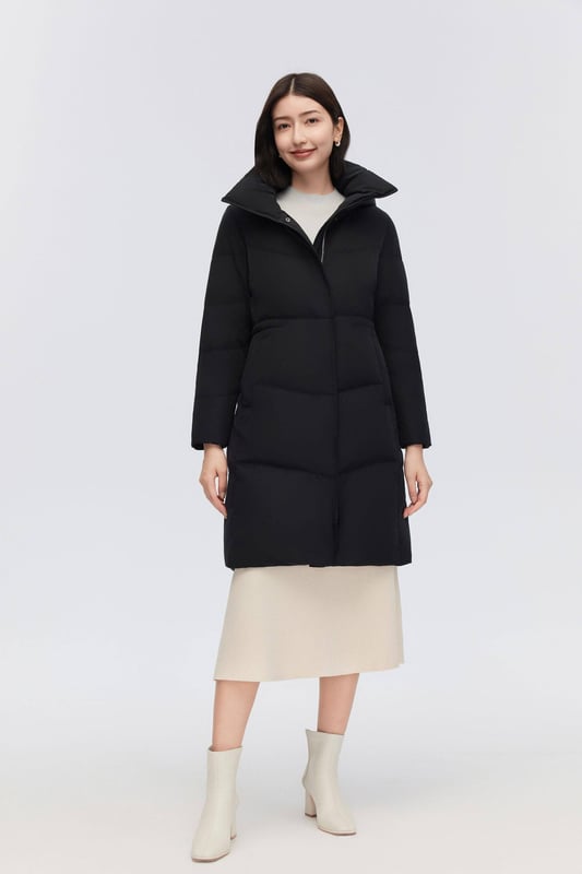 Crafted from smooth tech fabric, this lightweight coat offers windproof protection, stretchy inserts for freedom, and an adjustable drawstring waist.