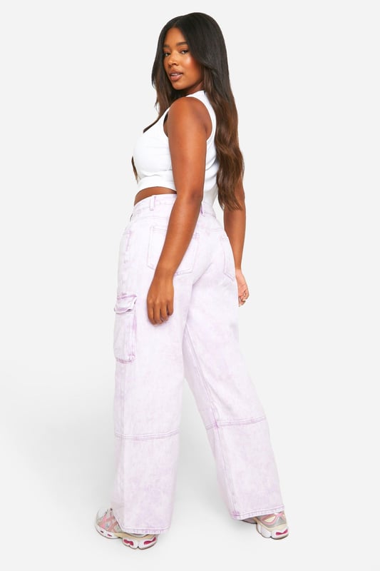 Wide-leg silhouette for a relaxed, on-trend look
        Multiple cargo pockets for added functionality
        High-waisted design to flatter your curves
        Soft denim fabric with stretch for comfort
        Versatile style suitable for various casual occasions
    
    Make a statement with these eye-catching cargo jeans that blend comfort and style effortlessly. The wide-leg cut offers a fashionable silhouette whilst the high-waisted design accentuates your curves beautifully. Perfect for those who love to stay ahead of the trends, these jeans can be styled for a multitude of casual events. Pair them with a cropped top and trainers for a laid-back day out, or dress them up with a fitted bodysuit and heels for a night with friends. The multiple cargo pockets add a practical touch, ideal for keeping your essentials close at hand during family gatherings or weekend adventures. Crafted from a soft denim fabric with a hint of stretch, these jeans ensure all-day comfort without compromising on style. Embrace the utility-inspired trend and make these cargo jeans your go-to choice for effortless, fashion-forward looks.