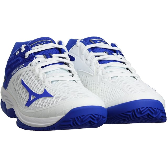 The Mizuno Wave Exceed Tour 4 CC Women's White Trainers are a stylish and high-performance footwear option designed for tennis enthusiasts and athletes seeking excellent comfort, support, and agility on the court. These trainers are part of Mizuno's renowned Wave Exceed Tour series, which is known for its cutting-edge technologies and innovation. Let's explore the key features of these tennis shoes:

Key Features:

 DynamotionFit Technology:  The trainers feature Mizuno's DynamotionFit technology, which ensures a secure and glove-like fit. This innovative design reduces stress on the foot and allows for natural movements, providing optimal comfort during intense gameplay.

 Wave Technology:  The Wave Exceed Tour 4 CC incorporates Mizuno's Wave technology in the midsole. The Wave plate enhances stability, cushioning, and responsiveness, providing excellent shock absorption and energy return during fast movements and abrupt stops.

 CC Sole Construction:  The trainers are equipped with a CC (Clay Court) sole construction, optimized for use on clay tennis courts. The outsole's herringbone pattern offers exceptional traction and grip, ensuring precise movements and rapid changes of direction.

 Lightweight and Breathable:  The upper of the trainers is crafted from lightweight and breathable materials, enhancing ventilation and reducing heat build-up. This keeps the feet cool and dry, even during extended matches.

 Durable Build:  Mizuno has designed these trainers with durability in mind. The reinforced toe cap and sturdy materials withstand the rigors of tennis play, ensuring the shoes remain in excellent condition over time.

 Padded Collar and Tongue:  The trainers feature a padded collar and tongue, providing additional comfort and reducing friction around the ankle area.