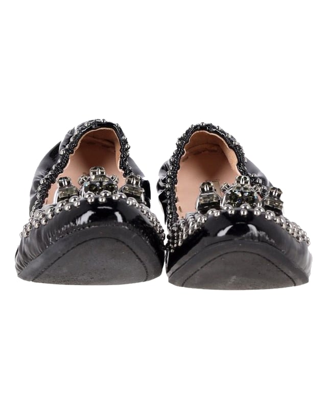 VINTAGE, RRP AS NEW
Fashion is the perfect blend of luxury and comfort and this pair of ballet flats from the house of Miu Miu exudes just that. These flats have been crafted from patent leather and they feature round toes with beautiful crystal embellishments on the cap and little stud details around the pair. These adorable flats are ideal for shopping and casual outings.

With box.

Miu Miu Embellished Ballerinas in Black Patent Leather
Color: black
Material: patent leather
Condition: good
Size: EU41
Sign of wear: wear at soles
SKU: 358278 / NAPPUGBSH358278W
