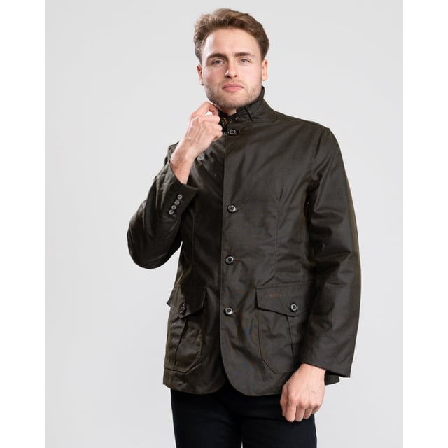 Mens Wax Jacket from the Original Classic Tartan Collection from Barbour. The Lutz Wax Jacket is a traditional mens wax jacket. With two pleated pockets, collar strap fastened with buckle and eyelets and corduroy collar the Lutz features many traditional Barbour details. Tartan cotton lining provides the finishing touch making the Barbour Lutz Mens Wax Jacket a stylish and practical option.
&nbsp;

8oz Oban, 100% Waxed Cotton
100% Cotton Barbour Tartan inner lining
100% Polyester in sleeve linings
Action back detail with stitched down half belt detail.
Sponge clean only
Back length: 27.5-31ins | 69.5-79.5cms
