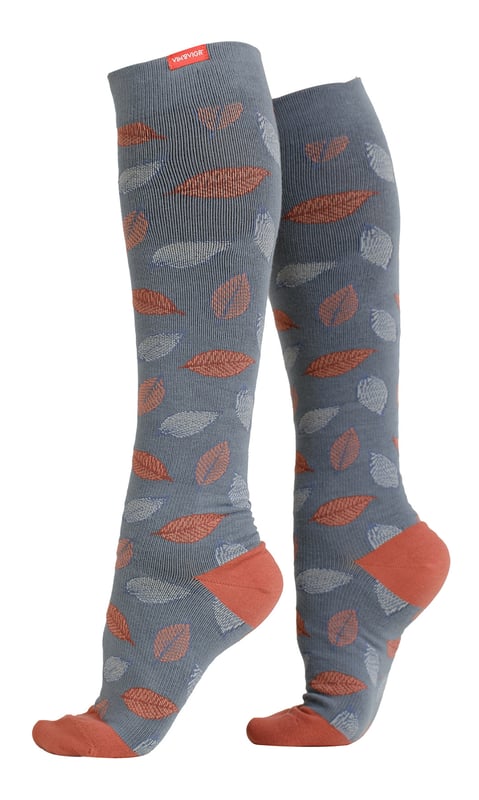 Energize your legs! Using integrally-knit graduated compression, these compression socks apply therapeutic pressure that starts at the ankle and gradually eases above. It’s this external pressure that energizes your legs and Reduces Swelling. These socks have a 20-30 mmHg compression level that is ideal for all-day, everyday wear, sitting or standing for long periods. High-quality premium cotton fibers and Spandex throughout the sock allow for sustained compression throughout the day. Alleviate achiness & heaviness by squeezing the legs from the bottom up, our legwear can help increase circulation of freshly oxygenated blood back to your legs. These are made for people with circulation problems and also ideal for flight travel, pregnancy, exercising, when sitting or standing for long periods of time and even during visits to hospital. These socks are specially designed to energise legs, reduce swelling, alleviate achiness & heaviness and to aid in muscular recovery. The specially designed fabric cotton blends and The 200-needle count gives supreme comfort and flexibility which contours leg and heel for superior fit. These socks are comfortable and breathable with graduated compression from ankle to calf with a contoured leg and heel for a great fit. The flexible toe pocket doesn’t squeeze the toes! They are also the extra wide style to fit comfortably around the wider legs and calves. Tested & Trusted: Based out of Missoula, Montana, VIM & VIGR is dedicated to creating products that provide you with everyday relief. VIM & VIGR graduated compression legwear was developed in partnership with vascular surgeons and vein clinics and all products are listed with the Food and Drug Administration (FDA). These compression socks are available in 8 colours and 3 sizes: Small/Medium, Medium/Large and Large/X-Large. They’re made out of 48% Cotton, 42% Nylon, 10% Spandex (Latex-free).