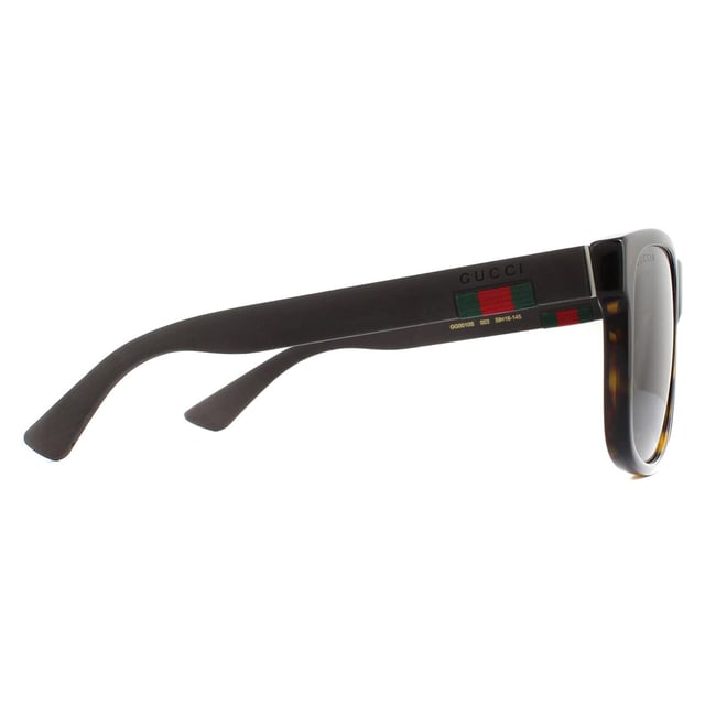 Gucci Sunglasses GG0010S 003 Havana and Grey Grey Polarized are a sophisticated lightweight D-frame model with bi-chromatic styling. The frame is an easy to wear shape that suits the majority of face shapes and is completed by Gucci's distinctive red and green brand logo..