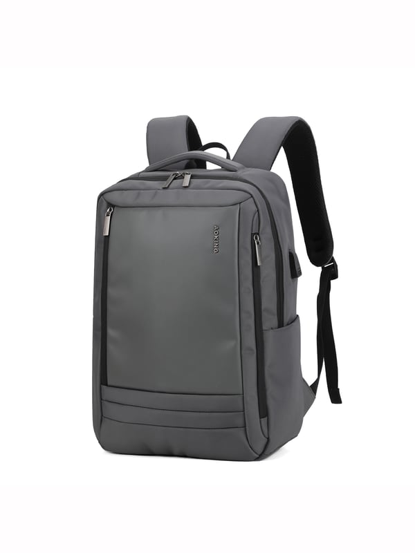 Mochila unisex. El cierre es con cremallera. Los bolsillos internos son bolsillos multifuncionales. Hay tres bolsillos externos con cremallera. Falta la correa para el hombro. El asa es de tela. Hay un compartimento interno. El material exterior es poliéster. Internamente está forrado en poliéster. Medidas: 30x15x42 cm. Producto de moda