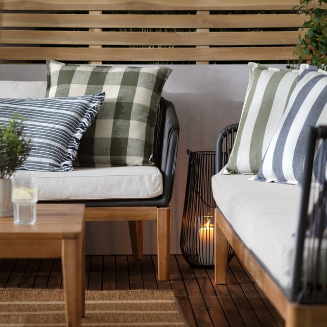 Elevate any outdoor space with the Hayle Cotton Outdoor Cushion, designed for both comfort and style. Crafted from soft-touch material treated for outdoor use, this cushion effortlessly blends durability with style. Its reversible striped design, featuring broad lines on one side and narrower ones on the other, allows for seamless transformations of outdoor settings. The water-resistant properties ensure resilience through every season, offering functionality without compromising aesthetics. Perfect for those seeking timeless, natural materials that enhance the ambiance of outdoor environments.