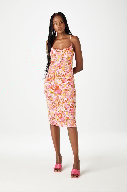 Our Sahara Slip Midi Dress featuring cowl neckline is the perfect look this summer. Team with strappy heels for summertime glam! Model is 5'9 and wears a size 8.