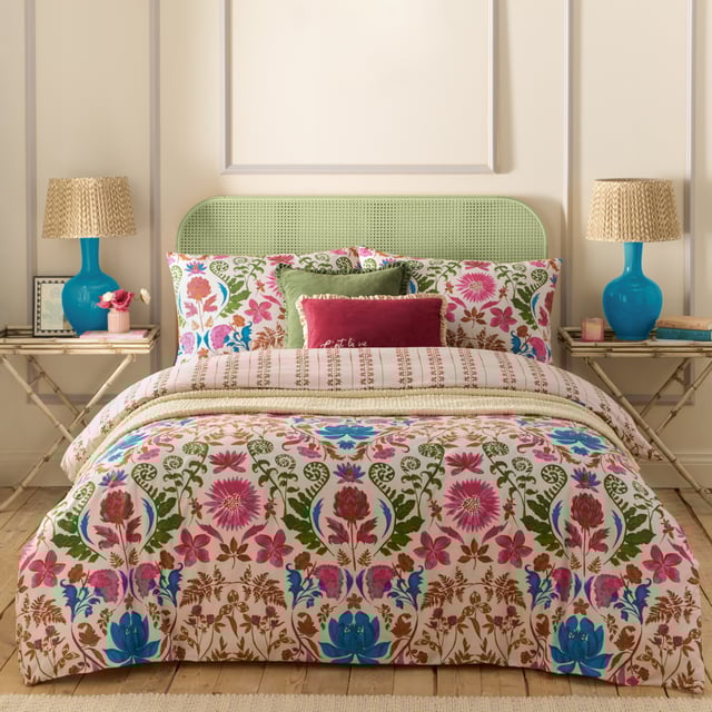 Inspired by the gardens of India, the Curious Lotus duvet cover set is filled with intriguing exotic florals and fauna. Bright pinks, cobalt blues, and warm pecans intertwine to create an eye-catching print. Complete with an intricate striped reverse, providing you with two distinct looks for a midweek refresh.