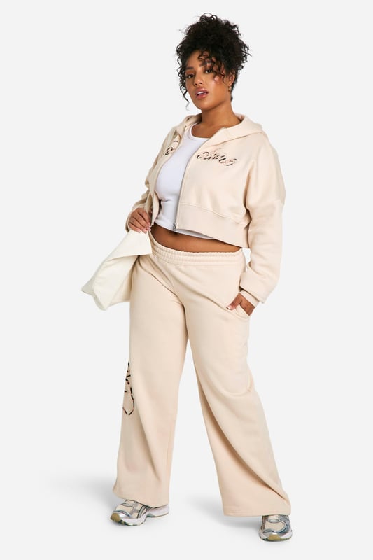 Striking leopard print design for a bold statement
        Wide-leg trousers for ultimate comfort and style
        Zip-up hoodie with cropped length for a trendy silhouette
        Coordinated set perfect for effortless dressing
        Soft cotton blend fabric for all-day comfort
    
    Make a fierce impression with this eye-catching leopard print tracksuit from Boohoo. The wide-leg trousers offer a relaxed fit that's perfect for lounging or running errands, while the cropped zip-up hoodie adds a contemporary twist to the classic tracksuit silhouette. Ideal for casual outings, this coordinated set allows for easy mixing and matching. Style it with chunky trainers and a crossbody bag for a laid-back weekend look, or dress it up with heeled boots and statement jewellery for a night out with friends. The versatile design makes it suitable for various casual occasions, from coffee dates to family gatherings. Embrace your wild side and stand out from the crowd in this bold and comfortable tracksuit that combines fashion-forward design with everyday wearability.