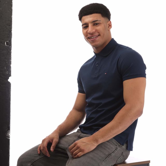 Mens Tommy Hilfiger Regular-Fit Polo Shirt in blue.- Polo collar.- Short-sleeved.- Two-button placket.- Tommy Hilfiger branding.- Tommy Hilfiger flag embroidery on chest.- Regular fit.- Ref: MW0MW35585DAF