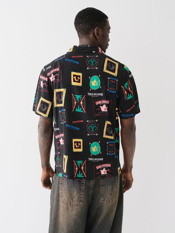 Grab your luggage and head to somewhere tropical in the Resort Print Camp Collar Shirt. Crafted from a soft woven fabrication, this men’s shirt features an allover conversational resort print, camp collar, short sleeves, and button-front closures.