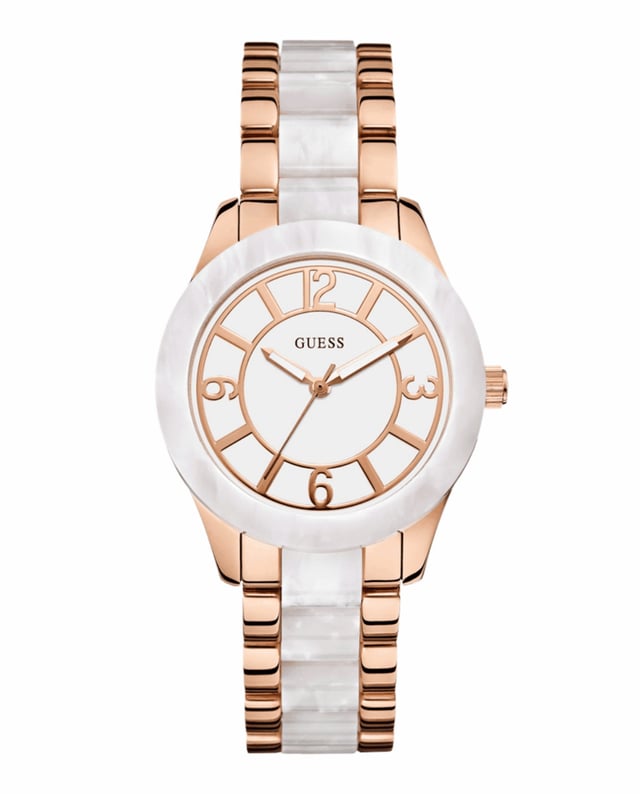 GUESS W0074L2 Uhr Frau Quarz• Material: Edelstahl• Glas: Mineral• Armband: Edelstahl - Polycarbonat• Farbe: Braun• Wasserbeständigkeit: 50 m (5 ATM)• Gehäusegröße: 37 mm