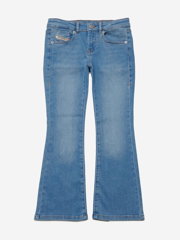 Diesel envision stunning innovative properties in their sleek silhouettes. These girls jeans embody the label's rebellious spirit by experimenting with bold, distinctive styles. Crafted in a bootcut style with a low waist and higher back coverage. This classic slim jean with a bohemian attitude hugs the body from the hips to the knees. Crafted from JoggJeans¬Æ fabric for the utmost comfort. They are in a clean light blue finish, enriched with a super-stonewashed treatment, broken details, frayed hems and contrasting-colour stitching. 65% Cotton, 30% Polyester, 5% Elastane
