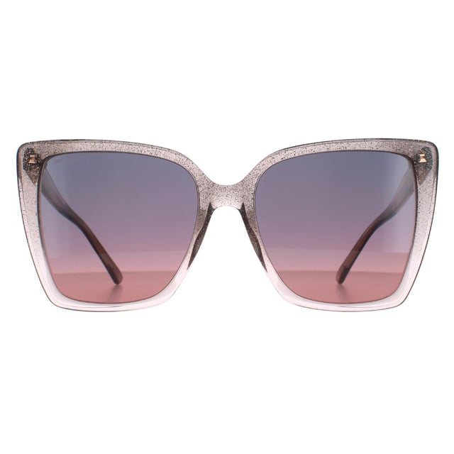 Jimmy Choo Cat Eye Womens Nude Glitter Grey Fuchsia LESSIE/S  Sunglasses are a stylish cat eye frame, enhancing your facial features while providing optimal sun protection. The high-quality acetate material used in their construction ensure durability and comfort, making them the ideal companion for both everyday wear and special occasions. The Jimmy Choo logo features on the temples for brand authenticity.
