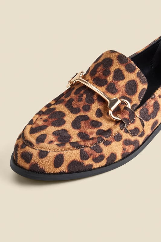 Leopard is a neutralSoft round toe silhouetteTimeless gold snaffle trim for a luxe touch Work smart, weekend cool Effortlessly cool with jeans and a blazer Add a pop of print to an all-black look