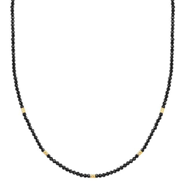 Are you looking for an enrichment for your jewelry box and have a penchant for modern healing stone designs? Then this necklace from the Glanzstücken München label is made for you. A strand of natural stone beads made of faceted spinel decorates your neckline and fascinates with the dark mysticism of the gemstone. Metal beads made of yellow gold-plated sterling silver create shimmering contrasts. The spinel not only looks elegant, but is also considered an encouragement that promotes a confident attitude to life. An extension chain with a spring ring clasp ensures a high level of comfort and a perfect fit in the décolleté.