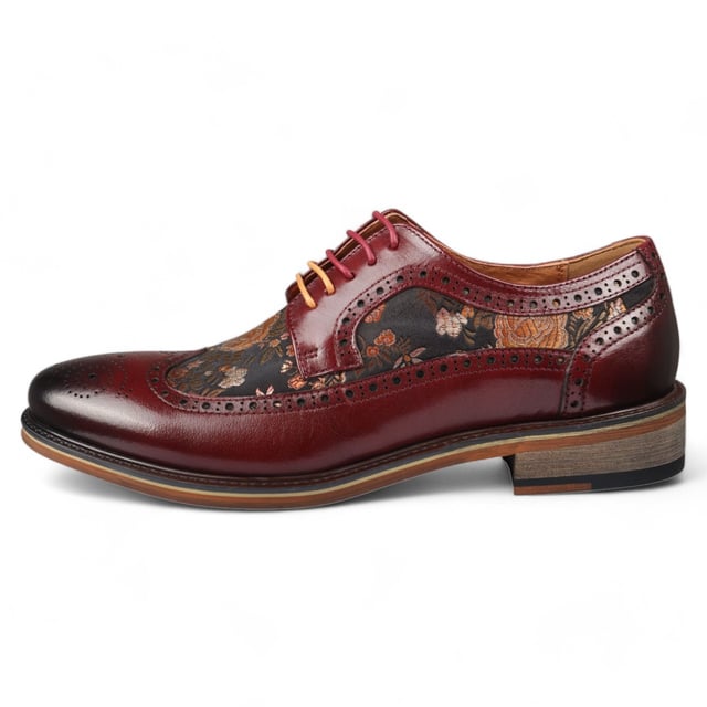 Add a unique touch to your formal wardrobe with the Ross Men's Floral Print Leather Brogue Shoes. Crafted from 100% premium leather, these brogues combine style, durability, and comfort. Featuring classic brogue detailing with decorative patterns, they bring elegance and sophistication to any look.

Unique Floral Print for a bold, stylish statement
Premium Leather for durability and luxury
Classic Brogue Detailing for timeless appeal
Lace-Up Design for an adjustable fit