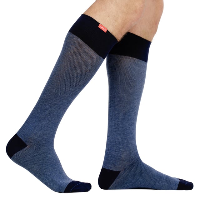 Energize your legs! Using integrally-knit graduated compression, these compression socks apply therapeutic pressure that starts at the ankle and gradually eases above. It’s this external pressure that energizes your legs and Reduces Swelling. These socks have a 15-20 mmHg compression level that is ideal for all-day, everyday wear, sitting or standing for long periods. High-quality premium cotton fibers and Spandex throughout the sock allow for sustained compression throughout the day. Alleviate achiness & heaviness by squeezing the legs from the bottom up, our legwear can help increase circulation of freshly oxygenated blood back to your legs. These are made for people with circulation problems and also ideal for flight travel, pregnancy, exercising, when sitting or standing for long periods of time and even during visits to hospital. These socks are specially designed to energise legs, reduce swelling, alleviate achiness & heaviness and to aid in muscular recovery. The specially designed fabric cotton blends and The 200-needle count gives supreme comfort and flexibility which contours leg and heel for superior fit. These socks are comfortable and breathable with graduated compression from ankle to calf with a contoured leg and heel for a great fit. The flexible toe pocket doesn’t squeeze the toes! They are also the extra wide style to fit comfortably around the wider legs and calves. Tested & Trusted: Based out of Missoula, Montana, VIM & VIGR is dedicated to creating products that provide you with everyday relief. VIM & VIGR graduated compression legwear was developed in partnership with vascular surgeons and vein clinics and all products are listed with the Food and Drug Administration (FDA). These compression socks are available in 17 colours and patterns and 3 sizes: Small/Medium, Medium/Large and Large/X-Large. They’re made out of 48% Cotton 42% Nylon, 10% Spandex and are machine washable.