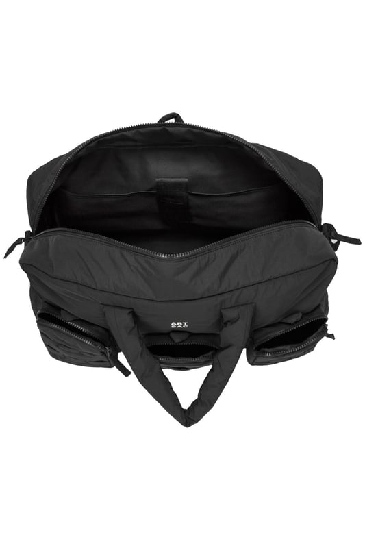 The ultimate carry companion, perfect for every day wear. Featuring a full-length zip top opening and 3 large side pockets, the Harring Padded Triple Holdall is spacious enough for any short or long trip away. Features a detatchable padded shoulder strap. Features: , Padded lightweight nylon, Water resistant, 15 inch padded laptop sleeve - Fits Apple MacBook Pro 16 inch, Grab handle carry straps, Removable padded shoulder strap allowing crossbody styling, Zip top opening to main compartment, ARTSAC screen printed logo, Triple front zip pocket with loops, Internal zip pocket, 2 Internal mobile phone slip pockets - Fits normal and plus size smart phones, 3 Internal pen slip pockets, External rear zip pocket Style Ref: 52010 BLACK