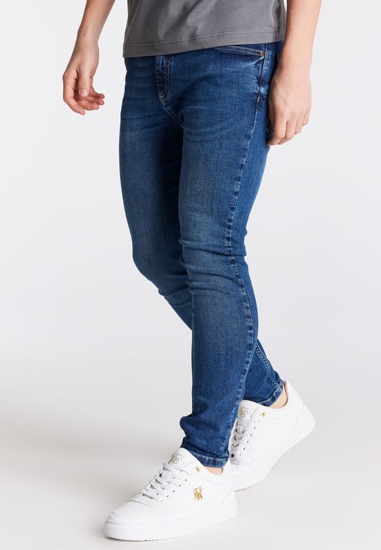 inchBoys Essential Midstone Skinny Denim JeanStretch DenimButton Waist with Belt LoopsTan Pu Patch With LogoMachine Wash98% Cotton 2% Elastane inch