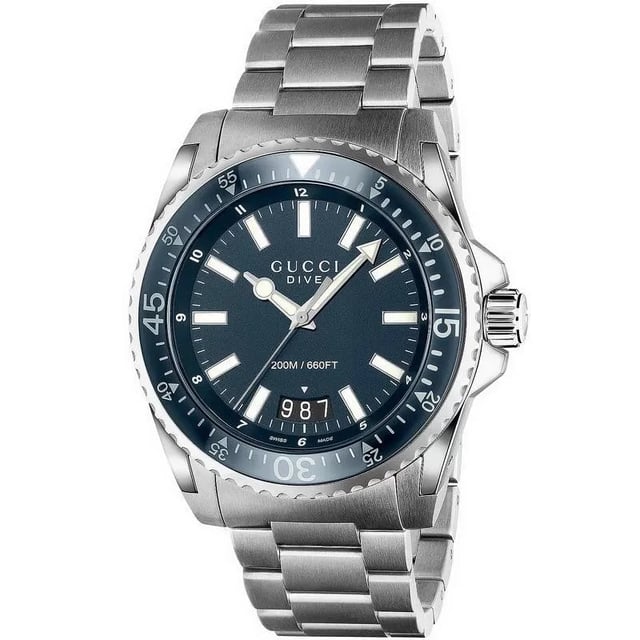 Product Specifications

Brand: Gucci
Model: YA136203
Movement: Swiss made quartz (battery)
Case Size: 45mm
Case Material: Stainless steel

Band Material: Stainless steel
Dial Colour: Blue

Glass: Sapphire crystal
Water Resistance: 200m or 20ATM
Warranty: 2 years Timepiece International warranty
FREE UK delivery

Product Descriptions
Elevate your wristwear to new heights with the Gucci Dive Stainless Steel Bracelet Blue Dial Men's XL Watch â€“ a fusion of impeccable style and Swiss precision. Immerse yourself in the world of luxury with a timepiece that effortlessly marries functionality with fashion, reflecting the timeless allure of Gucci.
Powered by a Swiss-made quartz movement, this watch ensures unrivalled accuracy and reliability. The battery-driven mechanism seamlessly integrates with the renowned Swiss craftsmanship, providing a timepiece that not only keeps precise time but also reflects the commitment to excellence synonymous with Gucci.
The 45mm case, crafted from durable stainless steel, presents a sleek and modern design that exudes sophistication. The meticulous attention to detail in both form and function makes this watch a versatile companion for any occasion, embodying the essence of contemporary luxury.
The stainless steel bracelet not only complements the case seamlessly but also adds a touch of refinement to your wrist. The link bracelet design ensures a comfortable fit while enhancing the overall elegance of this Gucci timepiece.
The striking blue dial serves as a canvas for timekeeping precision and aesthetic brilliance. The simplicity of the design, coupled with the signature Gucci detailing, makes for a dial that is both bold and timeless, embodying the brand's distinctive style.
Protected by scratch-resistant sapphire crystal, the dial remains clear and pristine, offering enduring clarity and protection against daily wear. This premium crystal ensures that your watch maintains its impeccable appearance over time.
With a remarkable water resistance of 200 meters or 20ATM, the Gucci Dive watch is not just a style statement but a reliable companion for underwater adventures. From diving to water sports, this timepiece is designed to withstand the rigors of aquatic activities.