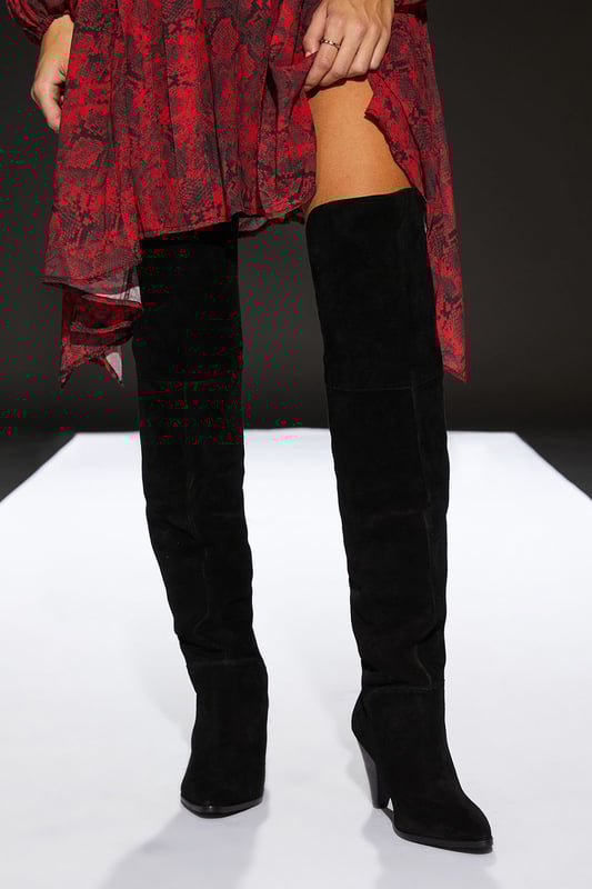 Luxurious suede over-the-knee boots
        Sleek pointed toe design
        Striking conical heel between 7 and 9cm
        Versatile day-to-night style
        Smooth, form-fitting silhouette
    
    Step into sophistication with these stunning over-the-knee boots from RUNWAY 1.8.1.8. The sumptuous suede texture and sleek silhouette create a look that's both elegant and edgy. Perfect for transitioning from day to night, these boots offer versatility in spades. Pair them with a flowing maxi dress for a romantic evening ensemble, or style with skinny jeans and an oversized jumper for a chic daytime look. The conical heel adds just the right amount of height without sacrificing comfort, making these boots ideal for long days at the office or nights out on the town. Whether you're dressing up or down, these boots will add a touch of glamour to any outfit, ensuring you stand out from the crowd with effortless style.