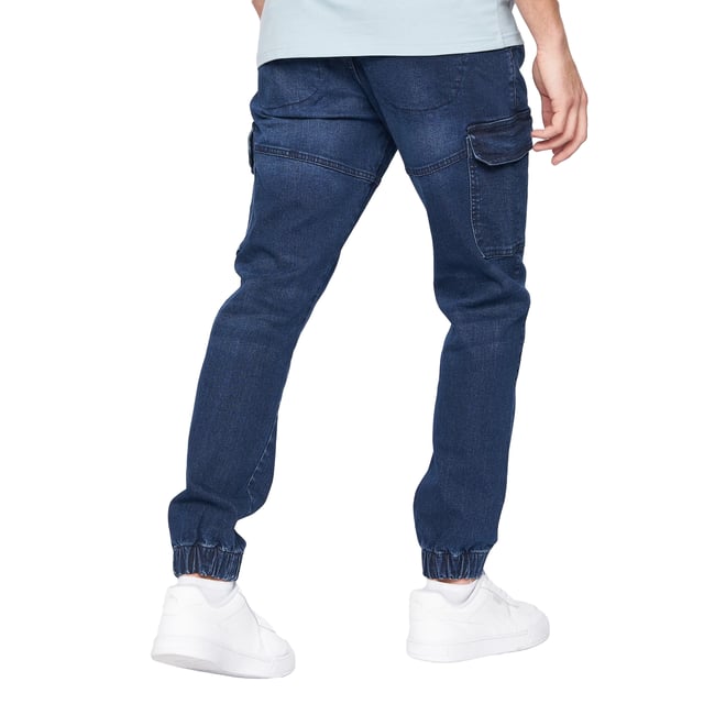 98% bomull, 2% elastan. Design: Slät. Fickor: 2 sidofickor, 2 bakfickor, 2 lårfickor. Manschett vid ankeln. Midja: Dragsko, elastisk.