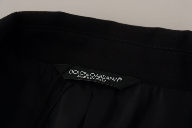 Stunning double breasted wool blazer with notch lapels
  Black color
  2-button fastening
  Logo details
  Made in Italy
  Material: 97% virgin wool 3% elastane
  Lining: 57% Cupro 43% Polyester
Material: 97% Virgin Wool 3% Elastane