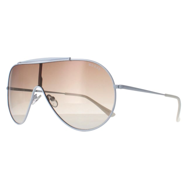 Guess Shield Womens White Brown Gradient GF0370  Sunglasses are a fashionable shield frame shape, exuding a sense of timeless elegance. The frame is crafted from high-quality metal, known for its durability and lightweight feel, ensuring long-lasting comfort throughout the day.