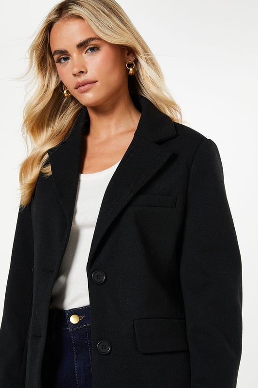 Sophisticated herringbone stripe pattern
        Versatile blazer-coat hybrid design
        Tailored fit with structured shoulders
        Front button closure for a polished look
        Functional front pockets for practicality
    
    This Dorothy Perkins Petite Herringbone Stripe Blazer Coat is the epitome of smart-casual chic. Perfect for the fashion-forward woman who values both style and comfort, this versatile piece effortlessly bridges the gap between a blazer and a coat. The herringbone stripe pattern adds a touch of sophistication, making it ideal for a variety of occasions, from brunch with friends to baby showers. Style it over a crisp white top and wide-leg trousers for a refined look that's sure to turn heads. The tailored fit flatters the figure while maintaining a professional appearance, ideal for those smart-casual events where you want to make an impression without overdoing it. This blazer coat is a wardrobe essential that will quickly become your go-to piece for adding a polished finish to any outfit.