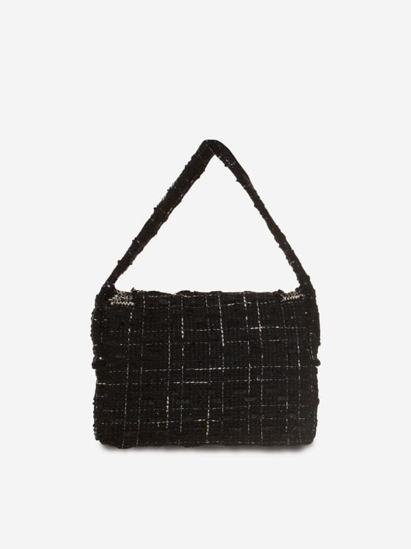 Patachou embody the finest high qualities this holiday season. This girls tweed handbag in black is reflective of the Portuguese label's passion for traditional abstracts. Made in a frayed tweed silhouette, it will be her favourite bag to show off this festive season.‚ Button Fastening‚ Shoulder Strap‚ Antiqued Hardware‚ Fabric: 100%