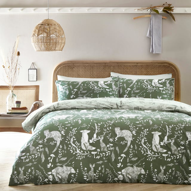 Explore our cosy and delicate take on the beauty of woodland creatures as you rest in the Buckthorn duvet cover set. Hand-drawn rabbits, foxes and bears pose among the delicate florals, which are set on an earth toned background. Flip the set over and the same design appears, but this time in inverted colours, giving you a fresh, evergreen look. An adorable and down to earth addition to your bedroom.
