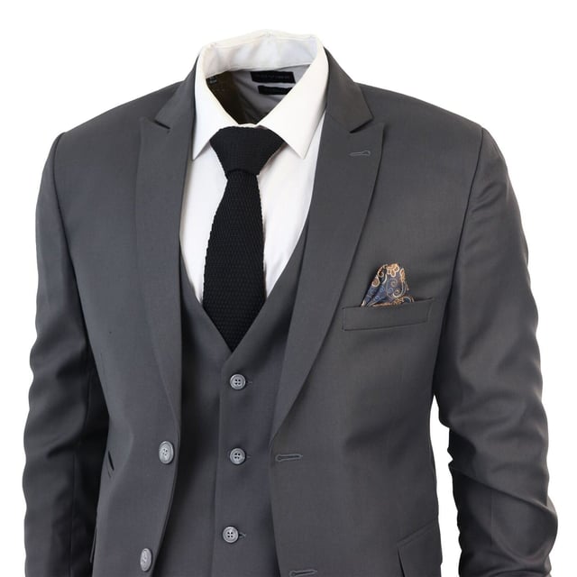 Indulge in Classic and Elegant Design with this men's 3-piece suit, featuring a timeless Charcoal color ideal for formal occasions. Product Design Bullet Points:  
Versatile Formal Attire: Suitable for weddings, business events, or special occasions, ensuring a sharp and well-dressed look.
 
Complete 3-Piece Set: Includes a jacket, vest, and trousers for a polished and coordinated outfit.
 
Premium Material: Crafted from high-quality materials for comfort and durability.
 
Tailored Fit: Offers a tailored fit that complements your body shape, enhancing your appearance and confidence.
 
Timeless Charcoal Color: Perfect for a classic and sophisticated look, suitable for various formal settings.  Made from a blend of 65% Polyester and 35% Viscose for a comfortable and stylish finishSizes	Jacket & Trouser Size
36R :	36" (Chest) 30" (Waist)
38R :	38" (Chest) 32" (Waist)
40R :	40" (Chest) 34" (Waist)
42R : 	42" (Chest) 36" (Waist)
44R :	44" (Chest) 38" (Waist)
46R : 	46" (Chest) 40" (Waist)
48R :	48" (Chest) 42" (Waist)
50R :	50" (Chest) 44" (Waist)
52R :	52" (Chest) 46" (Waist)
54R :	54" (Chest) 48" (Waist)