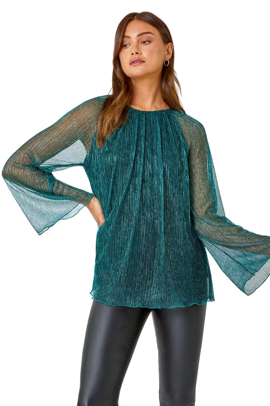 Plisse Overlay Wide Sleeve Top from Roman. Party all night in this plisse top! Cut from a glistening shimmer fabric, this top features a modest round neckline and extravagant wide sleeves to create a playful yet sophisticated style. Designed with a fitted underlay to keep you covered this top features a flirty keyhole cutout that accentuates the button fastening at the back of the neck. Pair with faux leather trousers and strappy heels and you’re sure to be the star guest at all of this season's parties!