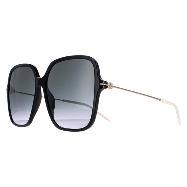 Las gafas de sol Gucci GG1267S 001 negro brillante y gris dorado degradado son un accesorio atrevido y a la moda que hará una declaración allá donde vayas. Estas gafas de sol presentan un exclusivo diseño de montura cuadrada fabricada con una ligera montura de acetato. El emblemático logotipo de Gucci destaca en las patillas, añadiendo un toque de lujo a este diseño ya de por sí sofisticado. Ya estés haciendo recados, tumbada en la playa o vistiéndote para salir por la noche, estas gafas de sol Gucci GG1267S te ayudarán a destacar entre la multitud.