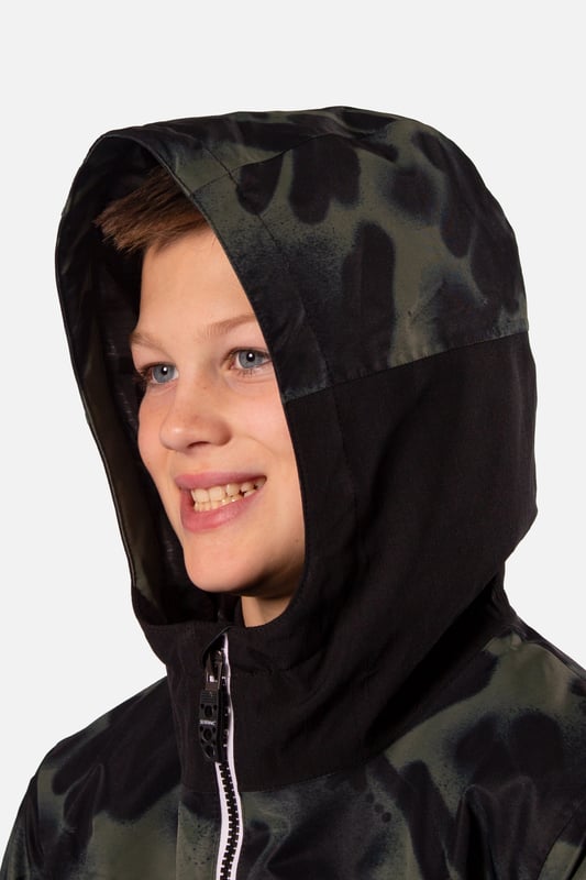 The Breaker snow overhead jacket stands out from the crowd and is our premium youth overhead jacket styled for maximum impact. The Breaker has fully taped seams and is highly waterproof to 10,000mm with a breathability rating of 10,000gms/M2 this technical snow jacket will make sure you’ll stay warm and dry. The Breaker jacket is made from our durable coated ripstop fabric and is feature packed. This jacket offers a great bang for your buck with under arm ventilation for when you need to dump heat, a powder skirt with Lycra wrist guards to keep the snow out and warmth in. A dry butt patch, to do exactly that, lift pass pocket on the left sleeve, soft chin guard, internal storm flap, zipped handwarmer pockets and a zipped comms pocket with headphone routing system all complete this street wear inspired piece.

Powder skirt - Whether you’re hitting the powder on skis or snowboard, this snow skirt creates a tight seal around your waist to keep the snow out and the warmth in. Made from durable waterproof materials and an internal dry butt patch (DBP) to keep it all warm and dry.

Snow cuff / wrist gaiter - This is perfect for even the most extreme conditions, featuring a tight seal that bridges the gap between your glove and jacket.

Zipped pockets - Pockets designed for everything you need for a full day up the mountain. Pockets for your lift pass, media, stash pocket for cash, wallet pocket and phone pocket for protection and to keep the battery warm.

Design features:

    Taped seams
    Fixed hood
    Super soft chin guard
    Zipped sleeve ski pass pocket
    Snow cuffs
    Twin zipped tricot lined hand warmer pockets
    Waterproof snow skirt
    Dry butt patch ( DBP )

Fabric & performance:

    Regular fit
    Shell 100% polyester
    Water resistant coating 10,000mm
    Breathbility rating MVP 10,000 gm²

Insulation & lining:

    100% recycled polyester low loft insulation.
    Insulation. 80 gm² body 40 gm² Sleeves
    Lining 100% recycled embossed polyester.