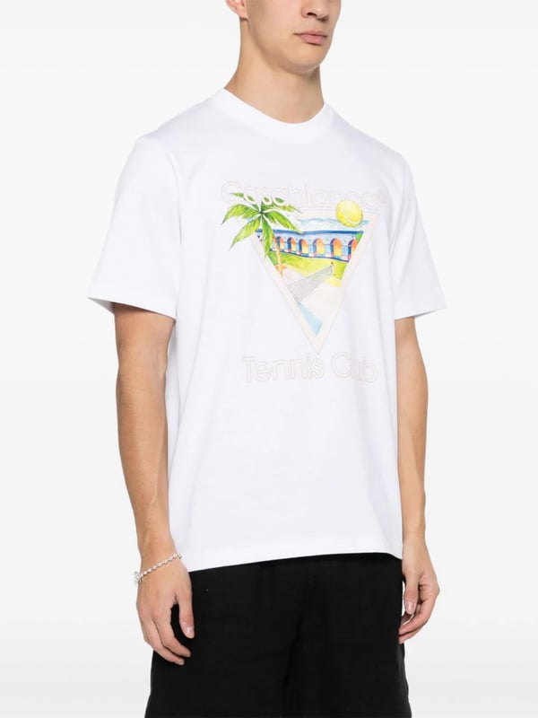Casablanca's graphics often depict a fantastical world of sporty utopian scenes – the illustrative print on this organic cotton T-shirt portrays a Mexican-inspired landscape with a tennis court in the middle.