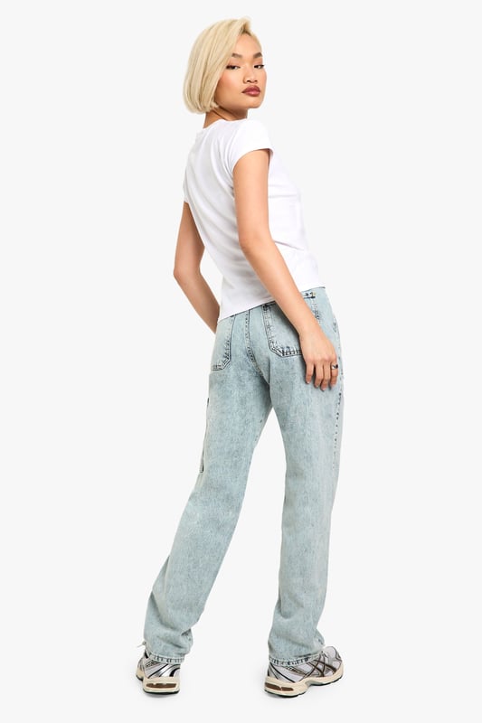 Trendy acid wash finish for a vintage-inspired look
        Straight fit design for a comfortable, relaxed silhouette
        Multiple cargo pockets for added functionality
        High-rise waist for a flattering fit
        Durable cotton construction for long-lasting wear
    
    Make a bold statement with these Acid Wash Cargo Straight Fit Jeans from Boohoo. Perfect for the fashion-forward woman who loves to blend comfort with style, these jeans offer a unique twist on a classic wardrobe staple. The straight fit provides a relaxed silhouette that's ideal for casual outings, while the acid wash finish adds an edgy, vintage-inspired touch. Style these jeans with a crisp white tee and an oversized leather jacket for an effortlessly cool look. Pair with trainers for a day of running errands, or dress them up with ankle boots for a night out with friends. These versatile jeans are a must-have for your casual wardrobe, offering endless styling possibilities for various informal occasions.