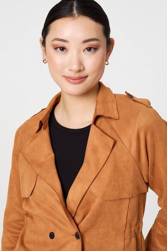 Add an extra layer lo your look with this cropped jacket. It's made from a soft suede feel fabric; and you can wear it over any outfit, including formal dresses or eveningwear. It has a lapel collar and button details, with long sleeves and a fitted shape. Pair this cropped jacket with smart trousers and you can wear it to work too.