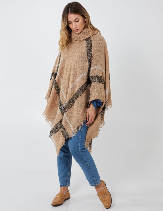 Keep warm in this season with our roll neck poncho. Soft fabrics and oversized style will going to help you keep this winter warm and cosy. Match with pair of jeans and sneakers for casual look.
100% Polyester Machine washable Roll neck  Approx length 60 cm  UnfastenedThis item is a ONE size that fits UK 8-14