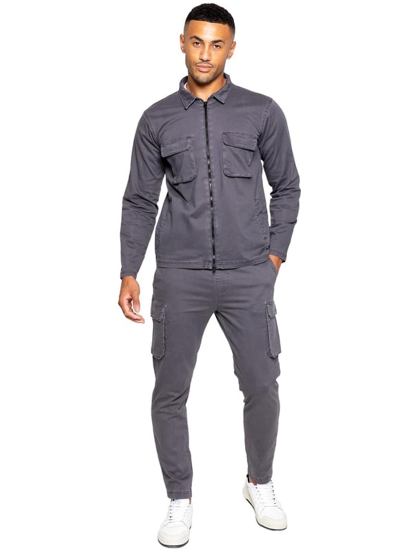 Enzo Mens Cargo Trousers. Regular Fit, Straight Leg, Enzyme Wash. 5 Pocket Design. 2 Side Pockets, 2 Cargo Pockets With Velcro Fastening. Single Back Welt Pocket. Elasticated Waistband With Adjustable Drawstring
