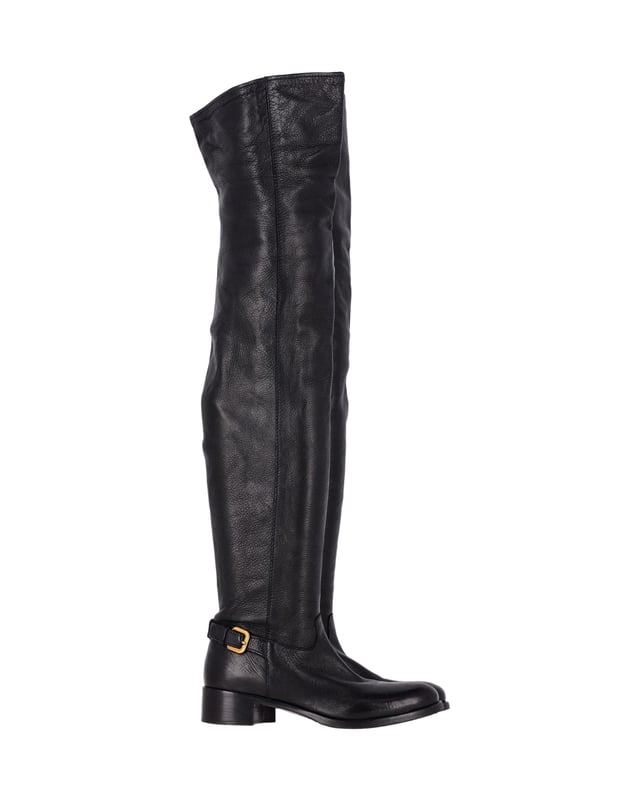 VINTAGE, RRP AS NEW
Step into style with the Prada Over-The-Knee Buckled Boots. These boots are crafted from soft and supple black leather, offering both comfort and luxury. The over-the-knee length creates a striking silhouette. With a low block heel and round toe, these boots boast a practical design. The gold-tone buckle on the side adds a classic and subtle detail, making these boots perfect for any occasion.

Prada Over-The-Knee Buckled Boots in Black Leather
Condition: Very good
Sign of wear: Moderate wear on the soles, minor creasing
Material: Leather
Color: Black
Size: IT37 / US7 / UK4
SKU: 360946 / HNPUGBSH360946W