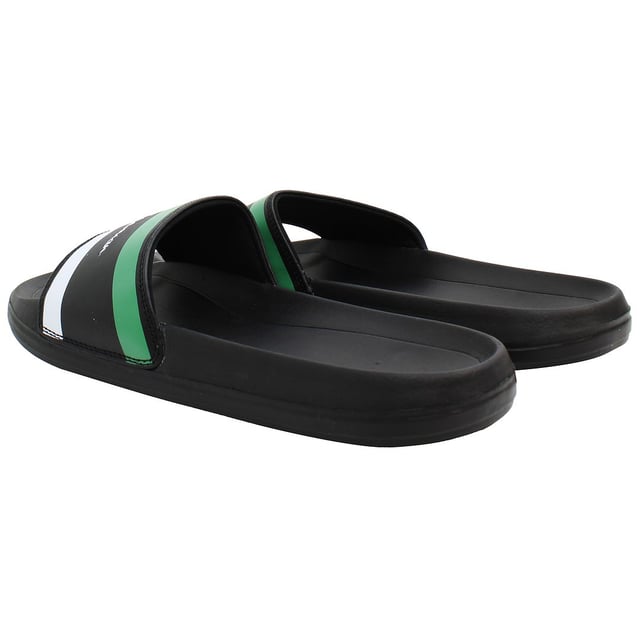 Ben Sherman Sidney Herren Flip-Flops, das Inbegriff von lässigem Komfort und zeitlosem Stil. Hier ist eine detaillierte Beschreibung, die ihre Hauptmerkmale hervorhebt:

Klassisches Design: Diese Flip-Flops verfügen über ein schlankes und minimalistisches Design, das die zeitlose Ästhetik von Ben Sherman verkörpert. Mit einer soliden schwarzfarbenen Optik ergänzen sie mühelos jedes Freizeitoutfit, von Strandbekleidung bis hin zu Alltagskleidung.

Hochwertige Materialien: Hergestellt aus hochwertigen Materialien, einschließlich einer langlebigen Gummisohle und einem bequemen Fußbett, sind diese Flip-Flops dafür ausgelegt, lange zu halten. Die weichen, aber stabilen Riemen sorgen für einen sicheren Sitz und verhindern Unbehagen oder Reizungen bei längerem Tragen.

Bequemes Fußbett: Die Sidney Flip-Flops verfügen über ein gepolstertes Fußbett, das sich den Konturen Ihrer Füße anpasst und mit jedem Schritt überlegenen Komfort und Unterstützung bietet. Egal, ob Sie am Strand entlang spazieren oder in der Stadt Besorgungen machen, diese Flip-Flops halten Ihre Füße erfrischt und entspannt.

Leicht und flexibel: Diese Flip-Flops sind für maximalen Komfort und Bewegungsfreiheit konzipiert, leicht und flexibel, sodass sie natürliche Fußbewegungen ermöglichen. Ob Sie am Pool entspannen oder neue Reiseziele erkunden, sie bieten die Flexibilität und Wendigkeit, die Sie für den ganztägigen Tragekomfort benötigen.

Einfach zu reinigen: Mit ihrem wasserresistenten Design sind diese Flip-Flops leicht zu reinigen und zu pflegen, was sie ideal für Strandausflüge oder Entspannung am Pool macht. Spülen Sie sie einfach mit Wasser ab, um sie frisch und bereit für Ihr nächstes Abenteuer zu halten.