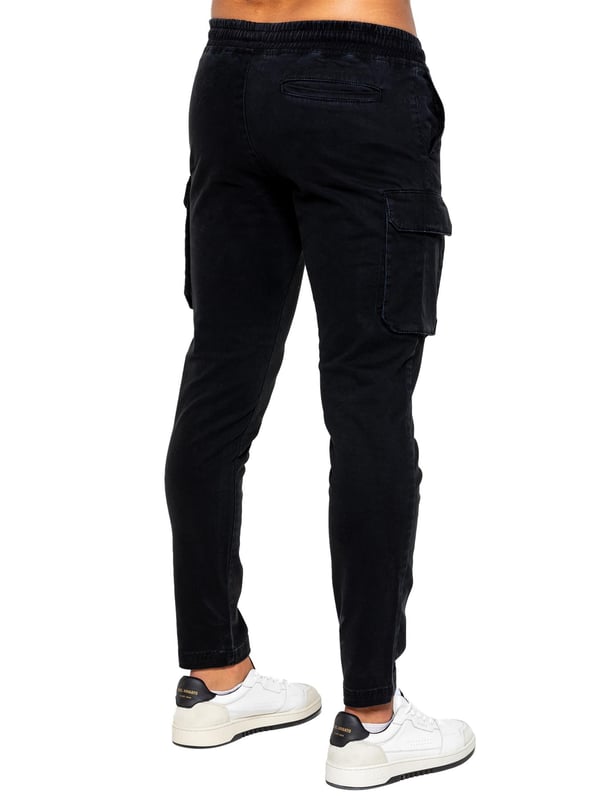 Enzo Mens Cargo Trousers. Regular Fit, Straight Leg, Enzyme Wash. 5 Pocket Design. 2 Side Pockets, 2 Cargo Pockets With Velcro Fastening. Single Back Welt Pocket. Elasticated Waistband With Adjustable Drawstring