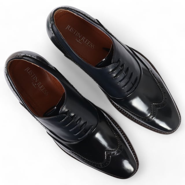 Make a bold impression with the Justin Reess Harry Men's Patent Leather Brogue Shoes in striking green. Crafted from vibrant green patent leather, these shoes are designed to stand out and elevate your formal attire. Featuring a classic brogue design with intricate perforations and decorative stitching, they embody elegance and sophistication for any occasion. The secure lace-up closure allows for a customizable fit, ensuring comfort throughout the day. Built with high-quality materials and expert craftsmanship, these shoes offer durability and longevity, making them a stylish addition to your wardrobe.

Striking Green Patent Leather for a bold statement
Classic Brogue Design with elegant perforations
Lace-Up Closure for a secure, adjustable fit
Durable Construction for long-lasting wear