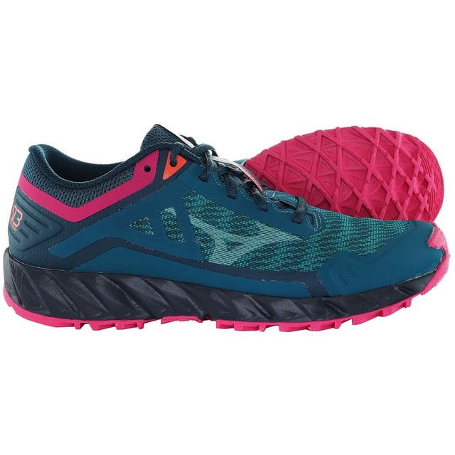Mizuno Wave Ibuki 3 Trail Women's Blue Running Trainers, specifically designed to elevate your trail running experience. These trainers boast an array of features that provide both performance and style, making them a perfect choice for adventurous female runners:

 Trail-Ready Traction:  The outsole of the Mizuno Wave Ibuki 3 Trail trainers is engineered with aggressive lugs and durable rubber, providing exceptional traction on rugged terrains. Conquer challenging trails with confidence and stability.

 Wave Technology:  The midsole is equipped with Mizuno's signature Wave technology, offering excellent cushioning and shock absorption. This ensures a smooth and responsive ride, even on uneven surfaces.

 Protective Toe Cap:  The trainers feature a protective toe cap that shields your toes from rocks, roots, and other hazards encountered on the trail. Stay protected without sacrificing flexibility.

 Breathable Upper:  The breathable upper construction keeps your feet ventilated during long runs. It prevents overheating and moisture buildup, promoting a comfortable and dry feel throughout your adventure.

 Secure Fit:  The trainers incorporate a secure lacing system that allows you to adjust the fit according to your preferences. Enjoy a snug and customized fit that reduces movement inside the shoe.

 Stability and Support:  With a supportive design, the Mizuno Wave Ibuki 3 Trail trainers offer stability and control on challenging terrains. Maintain your balance and confidence as you navigate varying surfaces.

 Lightweight Design:  Despite their trail-ready features, these trainers remain lightweight, preventing unnecessary strain during extended runs.

 Stylish Look:  Combining performance with aesthetics, the blue colorway with subtle Mizuno branding ensures you look great while conquering the trails.