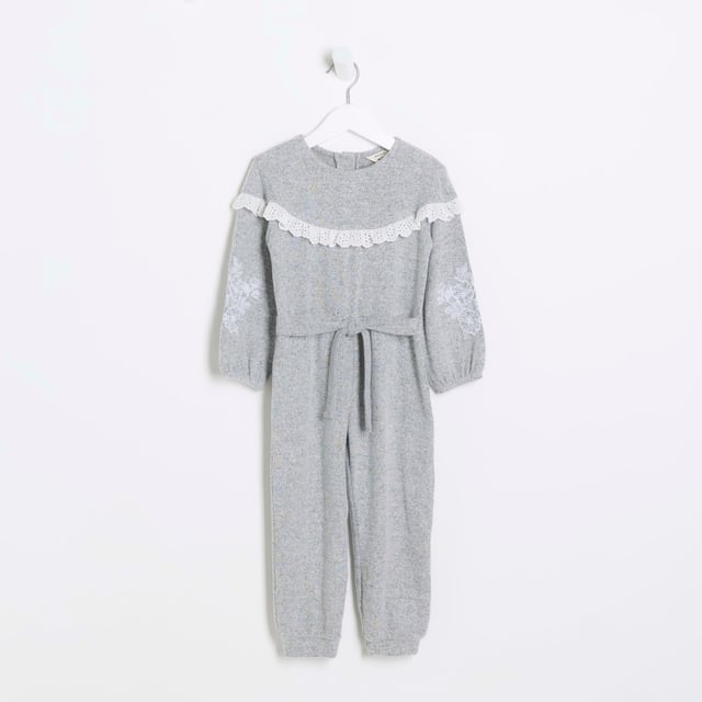 Broderie trim, Embroidered arm detail, Tie waist detail, Button back, Long sleeve, Cuffed hem