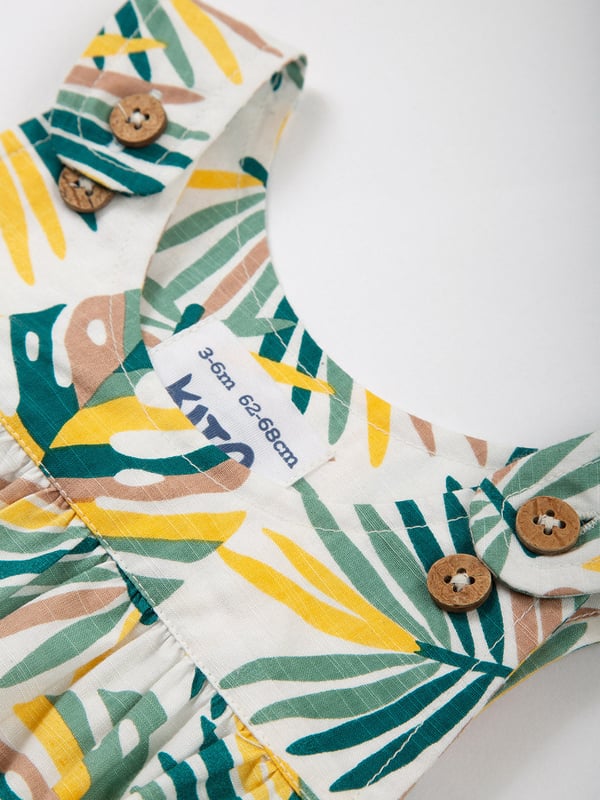 100% organic cotton | Proud to be certified to the Global Organic Textile Standard (GOTS) | Rainforest all-over print | Woven slub fabric | Bubble shape | Adjustable straps with coconut buttons | Popper crotch opening | Elasticated leg cuffs | Soft gathers to yoke | Made in India | Machine washable at 40 degrees, or at 30 degrees to be kinder to the planet